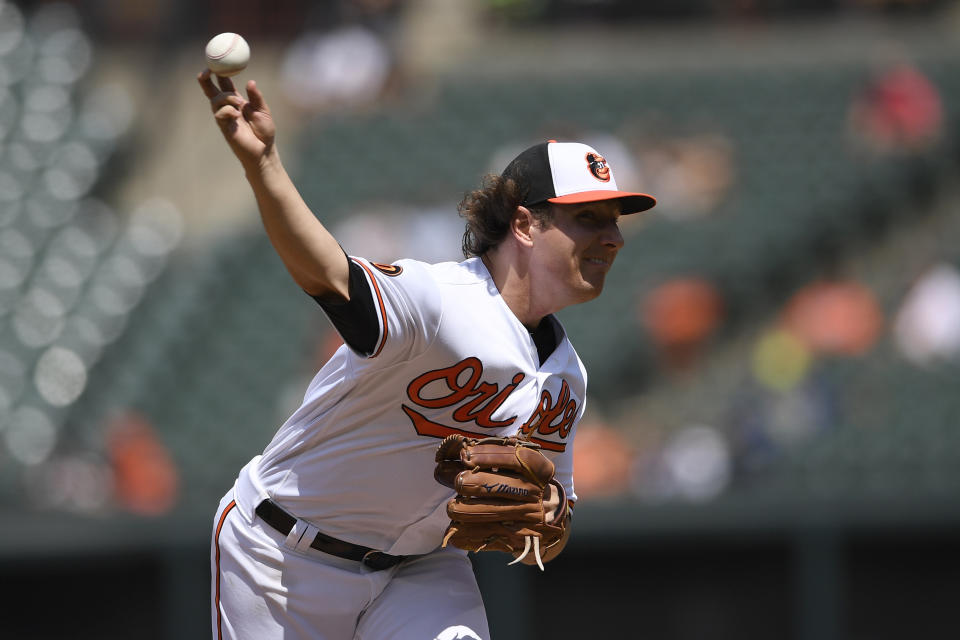 Baltimore Orioles starting pitcher Asher Wojciechowski delivers a pitch during the fourth inning of a baseball game against the Houston Astros, Sunday, Aug. 11, 2019, in Baltimore. (AP Photo/Nick Wass)