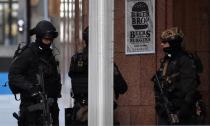 Police hold position near the cafe