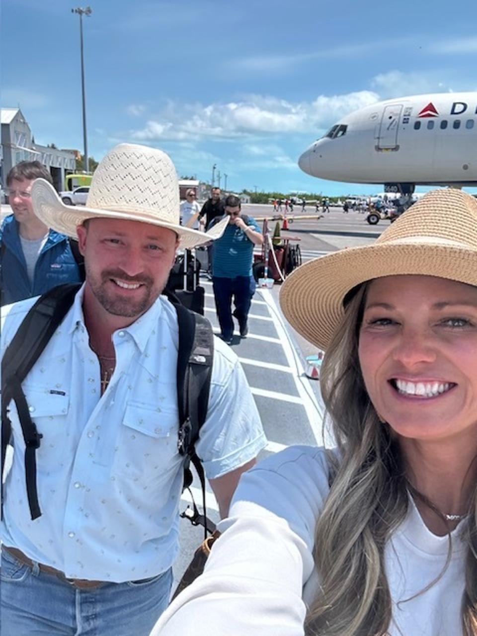 Ryan and Valerie Watson, pictured arriving in Turks and Caicos last month, were stopped by airport security on their way home from birthday celebrations in Turks & Caicos after hunting ammunition was found in their luggage (Valerie Watson)