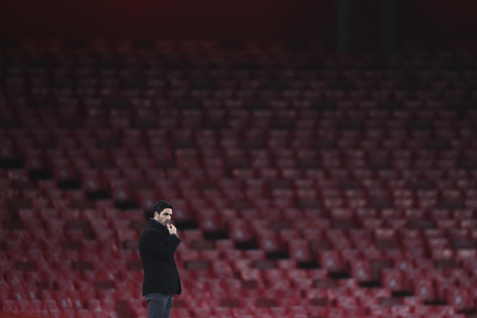 Arsenal's manager Mikel Arteta watches the play during an English Premier League soccer match between Arsenal and Burnley at the Emirates stadium in London, England, Sunday Dec. 13, 2020. (Laurence Griffiths/Pool via AP)