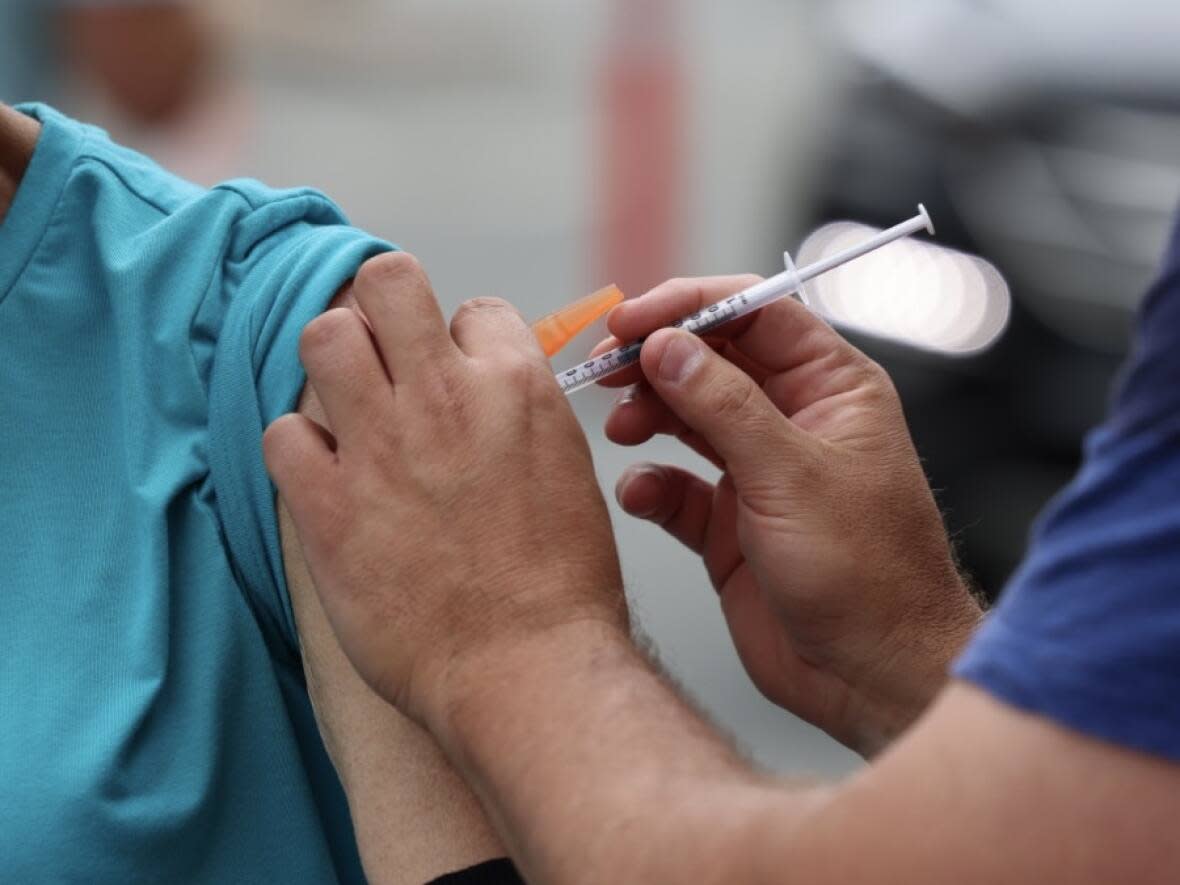 The City of Richmond has implemented a policy that mandates employees to provide proof of vaccination. A labour arbitrator has refused to stay the policy pending a challenge by unions. (Haley Ryan/CBC - image credit)