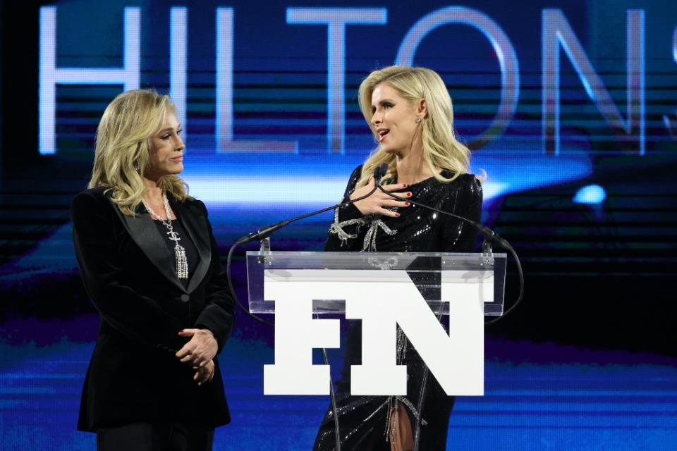 Kathy Hilton and Nicky Rothschild onstage at the 35th annual Footwear News Achievement Awards. - Credit: Getty Images for Footwear News