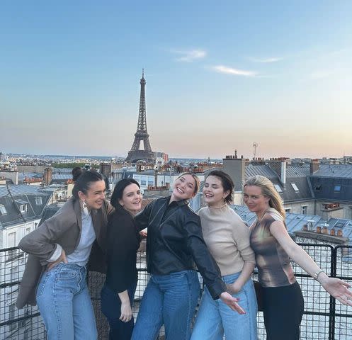 <p>Selena Gomez Instagram</p> Selena Gomez poses near the Eiffel Tower with friends