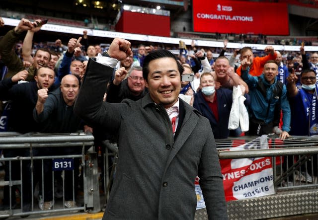 Leicester chairman Khun Aiyawatt Srivaddhanaprabha celebrates with fans 