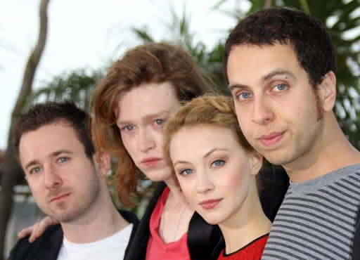 Director Brandon Cronenberg (R), actor Caleb Landry Jones (2nd L) and actress Sarah Gadon (2nd R) pose during a photocall for "Antiviral" at the Cannes film festival on May 20. Cronenberg premiered his first feature film, "Antiviral", in the festival's new talent section