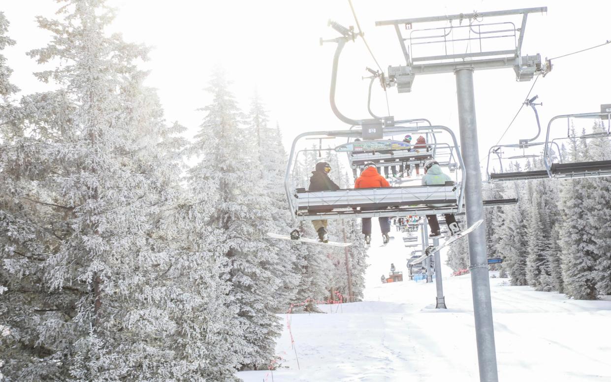 skiers on chairlift