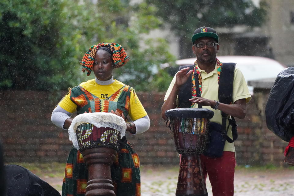 <p>People from Windrush and Reparatory Justice groups from around the UK attend an Emancipation Day gathering at the Max Roach Park, in Brixton, London. The groups are proposing a 'Windrush Act' to pay reparations and restore revoked citizenship to the Windrush Generation and their descendants. Picture date: Sunday August 1, 2021.</p>
