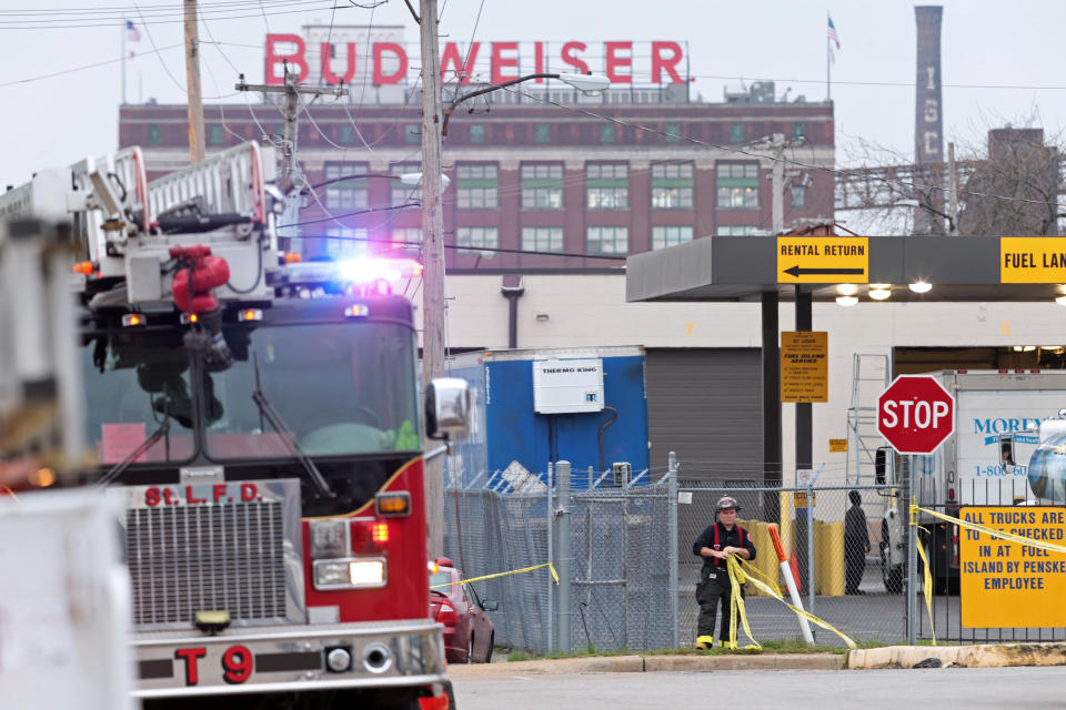 Crews work at the scene after a boiler exploded at a roof of a St. Louis box company and flew before crashing through the roof of a nearby laundry business on Monday, April 3, 2017. Authorities said several people were killed as a result of the explosion. (Cristina M. Fletes/St. Louis Post-Dispatch via AP)