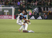 Minnesota United celebrates defeating the Portland Timbers after an MLS soccer match at Providence Park in Portland, Ore. on Saturday, May 20, 2023. (Vickie Connor/The Oregonian via AP)