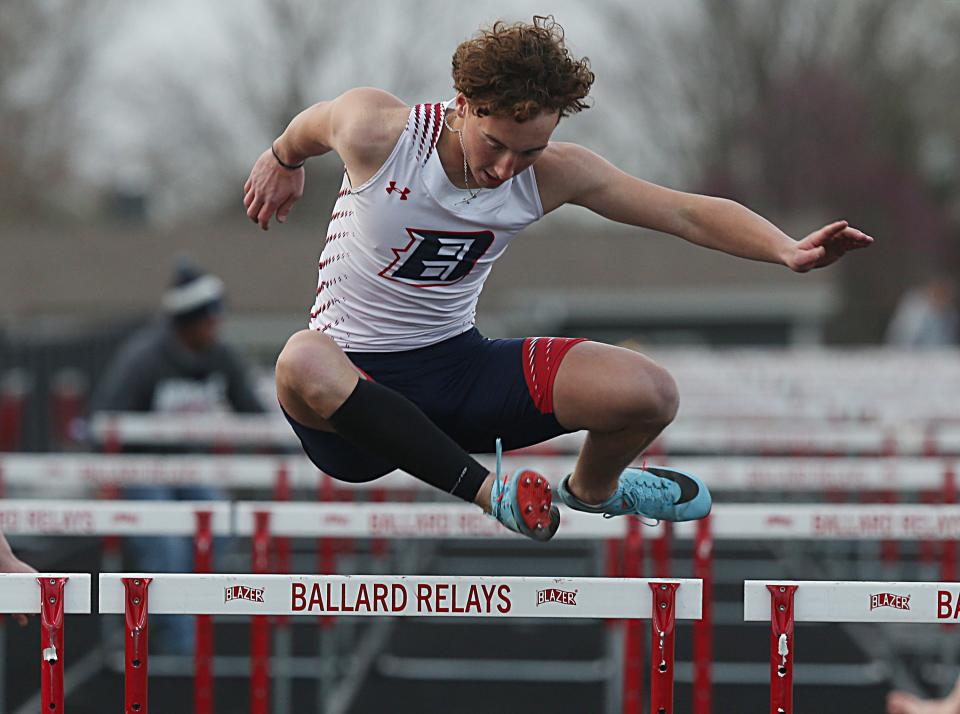 Ballard's Stetson Kane crosses the bar during boys' 110-meter hurdle at the Bomber Relays on Tuesday, April 18, 2023, in Huxley, Iowa.