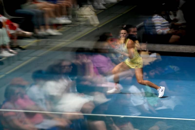 American tennis player Emma Navarro in action against Ukraine's Dayana Yastremska during their women's singles third round tennis match of the 2024 Australian Open at Melbourne Park. Lukas Coch/AAP/dpa