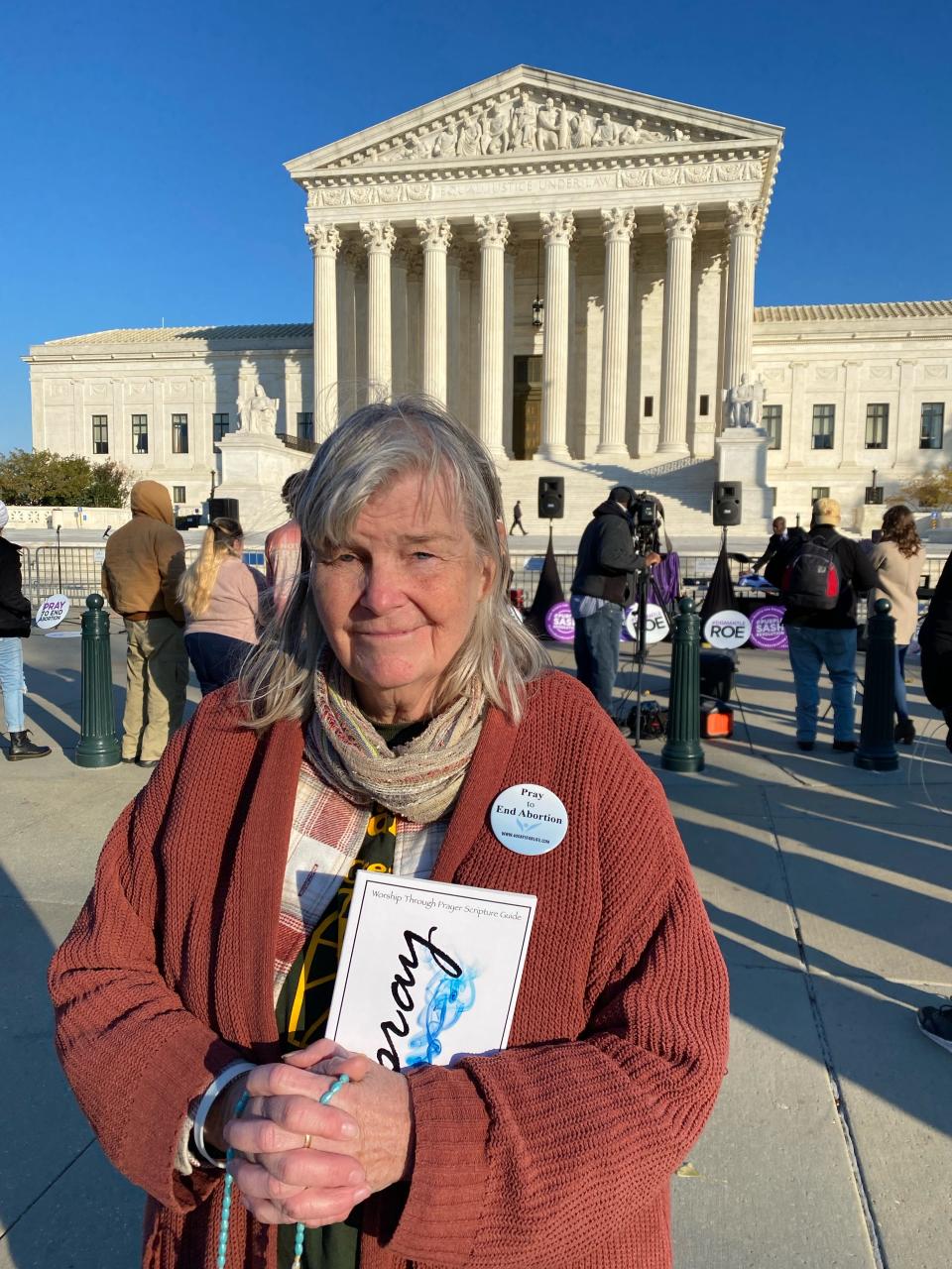 Joan Bell, 73, of Montague, N.J., prayed outside the Supreme Court for the lives of children on Nov. 30, 2021: "We always believe that love is the answer to any situation."