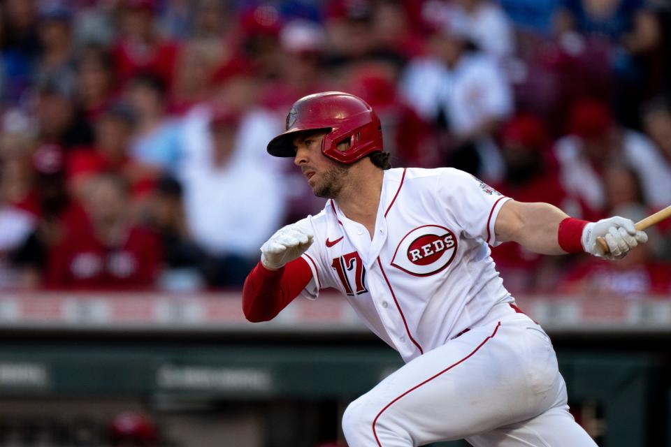 Reds infielder Kyle Farmer was traded to the Twins on Friday for minor league pitcher Casey Legumina.