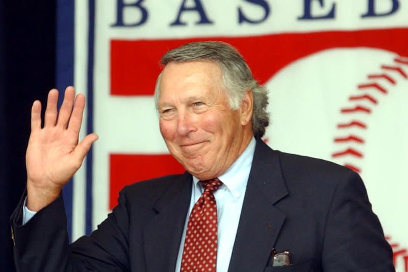 Brooks Robinson, formerly of the Baltimore Orioles, waves as he is introduced at the National Baseball Hall of Fame induction ceremonies for Ozzie Smith in Cooperstown, N.Y., in July 2002. File Photo by Bill Greenblatt/UPI