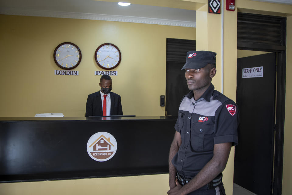 FILE - A security guard stands in the reception area of the Hope Hostel, which is one of the locations expected to house some of the asylum-seekers due to be sent from Britain to Rwanda, in the capital Kigali, Rwanda on June 10, 2022. Rwanda government's deputy spokesperson Alain Mukuralinda said Tuesday, April 23, 2024, it's ready to receive migrants from the United Kingdom after British Parliament this week approved a long-stalled bill seeking to stem the tide of people crossing the English Channel in small boats by deporting some to the East African country. (AP Photo, File)