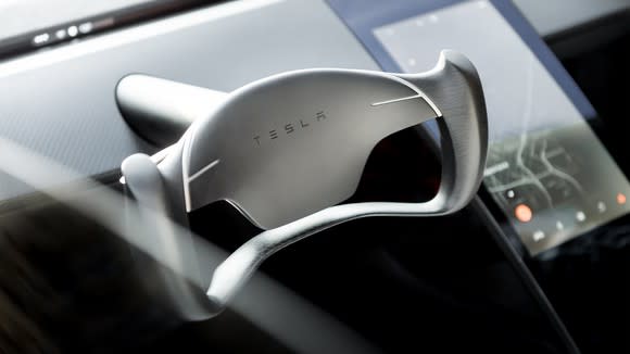 The steering wheel and center touchscreen console on Tesla's new Roadster.