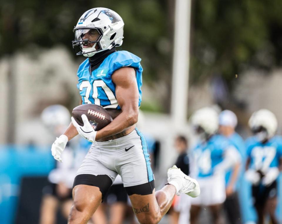 Carolina Panthers Chuba Hubbard runs the ball during the Carolina Panthers Training Camp in Charlotte, N.C., on Monday, August 5, 2024.