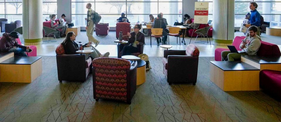 Students study and socialize Thursday, Nov. 16, 2023, inside of Engineering Hall in Madison, Wis.