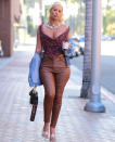 <p>Iggy Azalea flaunts her figure on Thursday while out for a fro-yo run in Beverly Hills.</p>