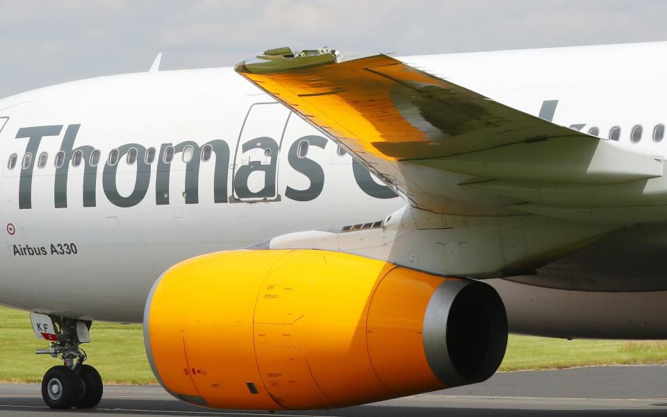 Thomas Cook flight turned back and made an emergency landing back at Manchester Airport with the tip of one of its wings missing  - Credit: Eamonn and James Clarke 