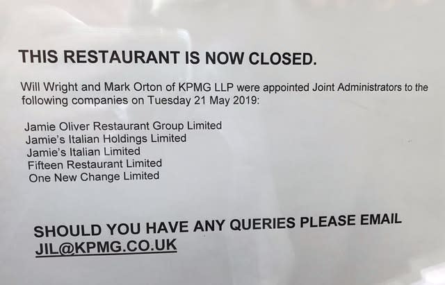 A sign in the window of a Jamie’s Italian restaurant