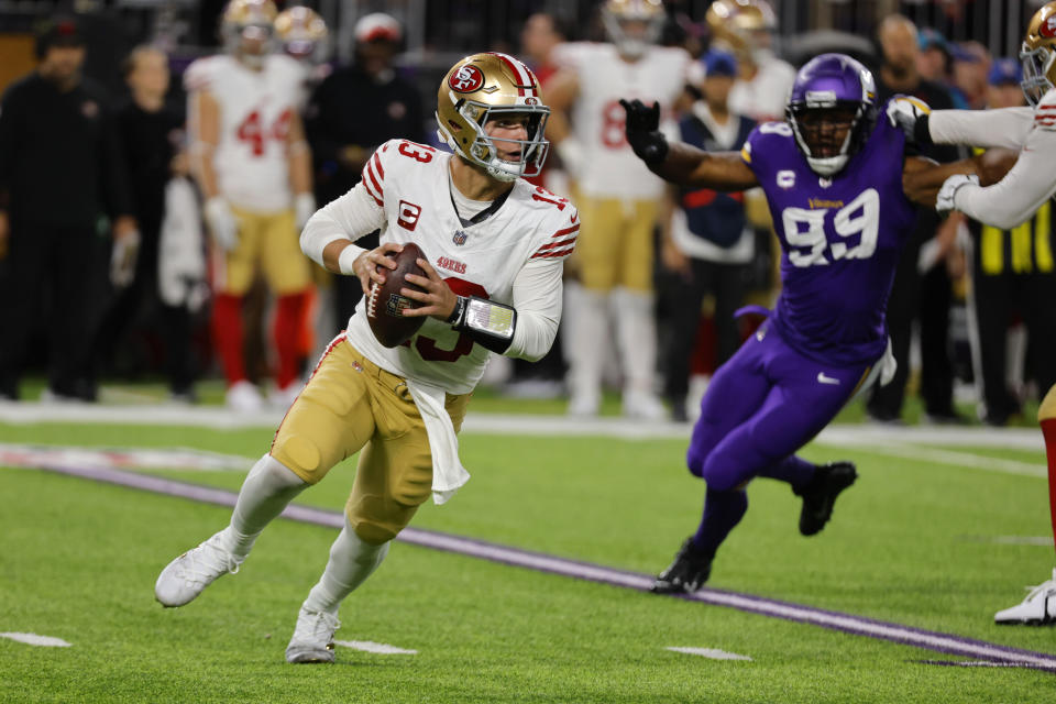 San Francisco 49ers quarterback Brock Purdy (13) looks to pass during the second half of an NFL football game against the Minnesota Vikings, Monday, Oct. 23, 2023, in Minneapolis. (AP Photo/Bruce Kluckhohn)
