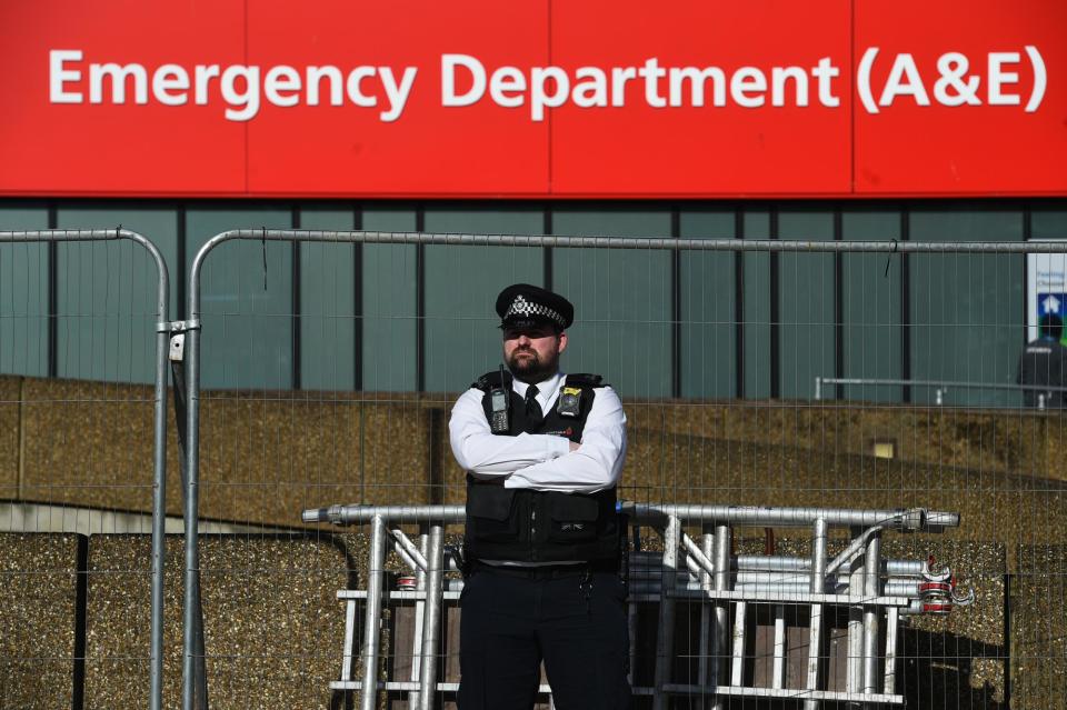 Police officer on patrol outside St Thomas' Hospital in Central London where Prime Minister Boris Johnson is in intensive care as his coronavirus symptoms persist: PA