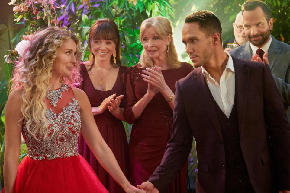 Alexa PenaVega, Sherry Miller, Carlos PenaVega amd Carlos Gonzalez-Vio in “Never Too Late to Celebrate.” | Albert Camicioli, Hallmark Media