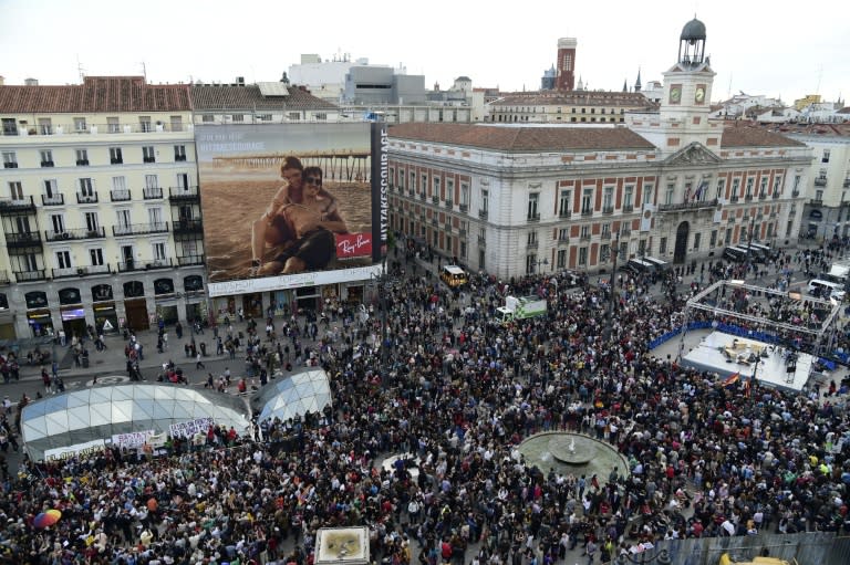 Demonstrators gather at Puerta del Sol square after a demonstration marking the fifth anniversary of the "Indignados" movement in Madrid, on May 15, 2016