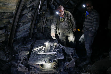 Miners work inside the Novovolynska-9 coal mine in Novovolynsk, Ukraine August 2, 2018. Picture taken August 2, 2018. REUTERS/Valentyn Ogirenko