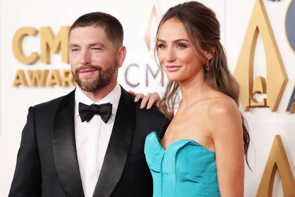 <p>Christopher Polk/Variety via Getty</p> Chris Lane and Lauren Bushnell Lane attend the 2023 CMA Awards 