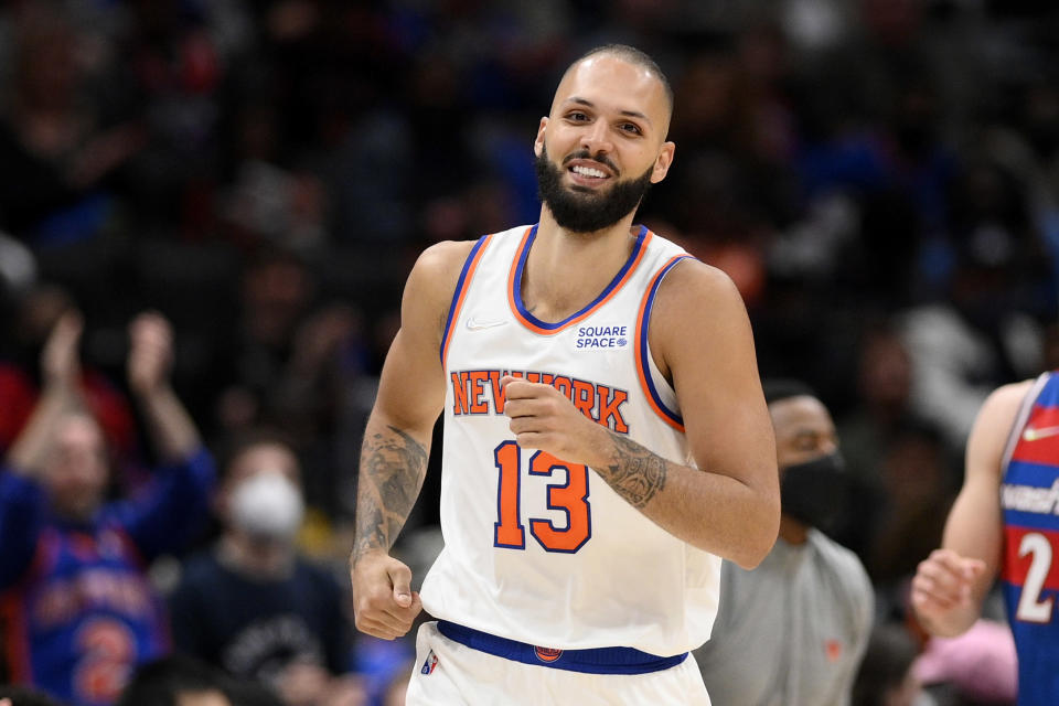 New York Knicks guard Evan Fournier reacts after his 3-point basket during the first half of the team's NBA basketball game against the Washington Wizards, Friday, April 8, 2022, in Washington. (AP Photo/Nick Wass)