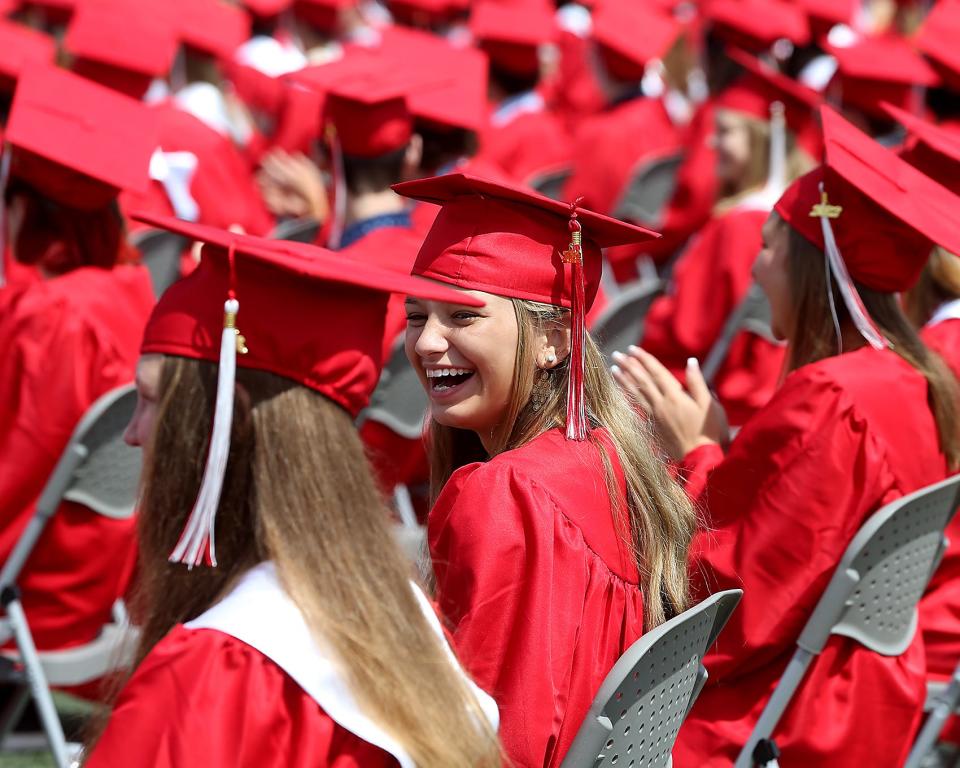 Senior Anna Williams smiles during Hingham High's graduation at Hingham High School on Saturday, June 4, 2022.