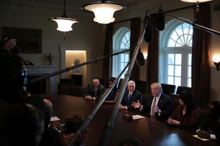 U.S. President Donald Trump and Vice President Mike Pence attend a meeting with the Congressional Black Caucus Executive Committee at the White House in Washington, DC, U.S., March 22, 2017. REUTERS/Carlos Barria