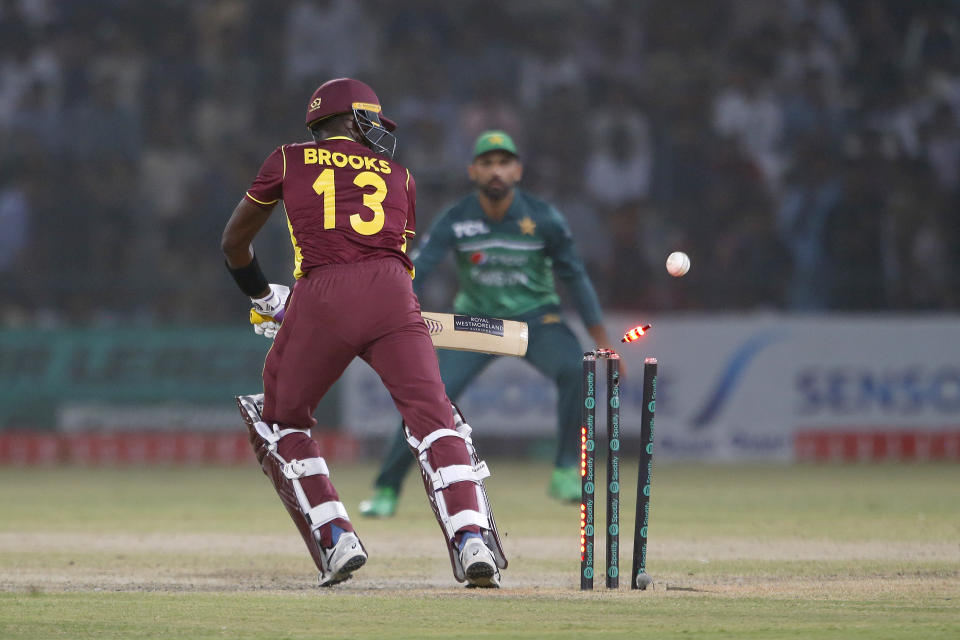 West Indies' Shamarh Brooks is bowled out by Pakistan's Mohammad Wasim during the third one day international cricket match between Pakistan and West Indies at the Multan Cricket Stadium, in Multan, Pakistan, Sunday, June 12, 2022. (AP Photo/Anjum Naveed)