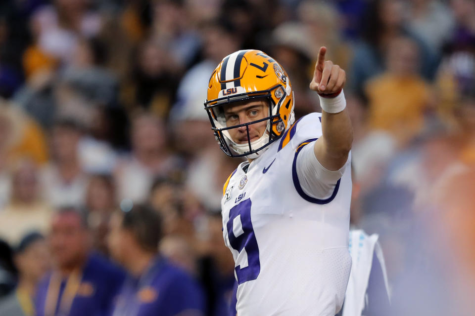 LSU quarterback Joe Burrow (9) warms up before an NCAA college football game against Florida in Baton Rouge, La., Saturday, Oct. 12, 2019. (AP Photo/Bill Feig)