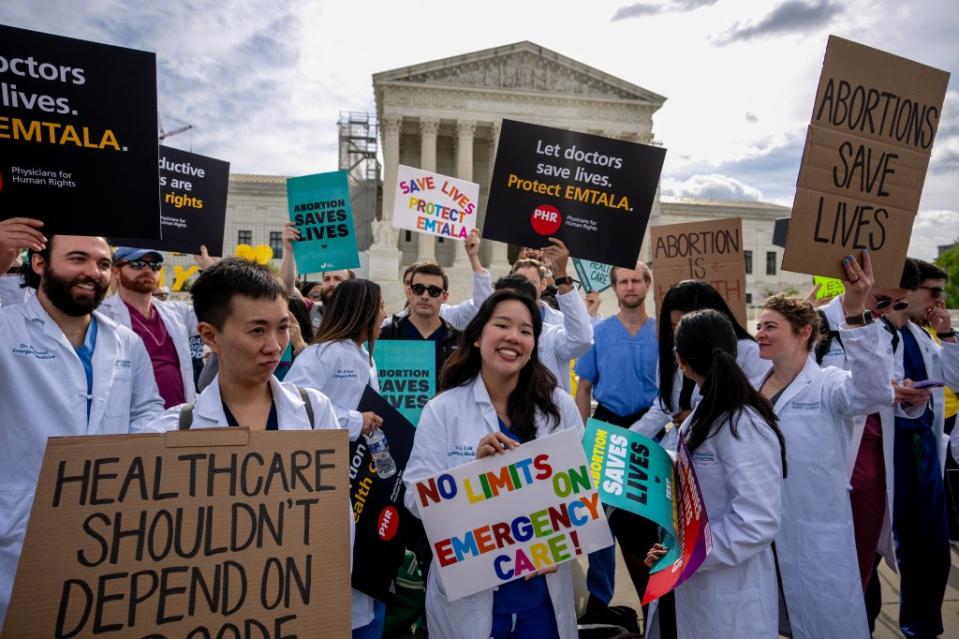 A group of doctors join abortion rights supporters at a rally outside the Supreme Court on April 24, 2024 in Washington, DC. Getty Images