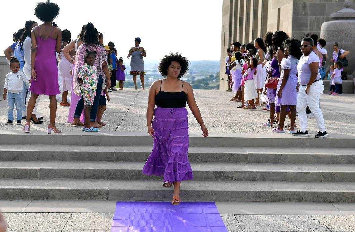 Participants take part in a runway show during the 6th Annual KC Curly Photoshoot at the Liberty Memorial.