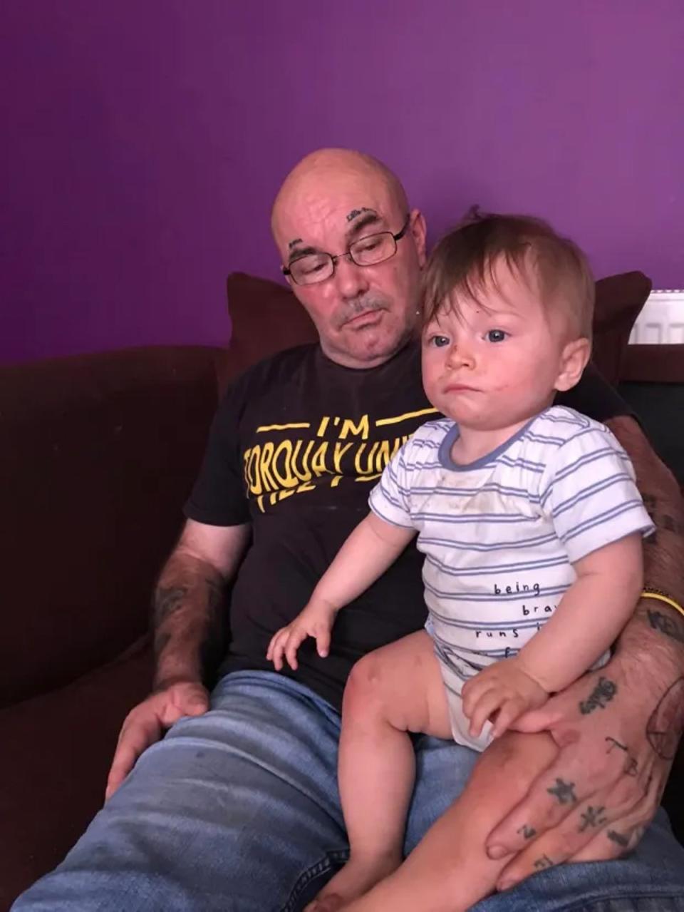 Bronson Battersby, 2, with his father Kenneth, 60, who allegedly died of a heart attack shortly after 26 December (Facebook)