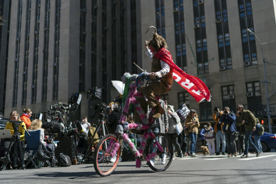 A Trump supporter takes part in a protest near the Manhattan District Attorney's office, Tuesday, March 21, 2023, in New York, in an anticipation of former President Donald Trump's possible indictment. A New York grand jury investigating Trump over a hush money payment to a porn star appears poised to complete its work soon as law enforcement officials make preparations for possible unrest in the event of an indictment. (AP Photo/Eduardo Munoz Alvarez)