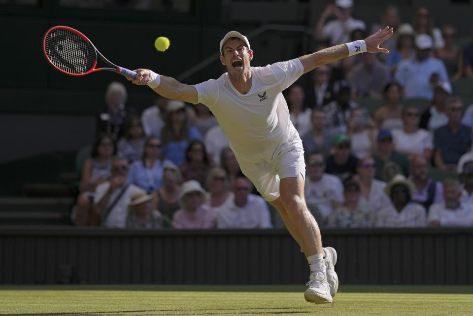 Britain's Andy Murray returns to Stefanos Tsitsipas of Greece in a men's singles match on day five of the Wimbledon tennis championships in London, Friday, July 7, 2023. (AP Photo/Alberto Pezzali)