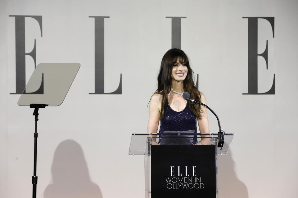 Anne Hathaway speaks onstage during ELLE's 29th Annual Women in Hollywood  (Frazer Harrison / Getty Images for ELLE)