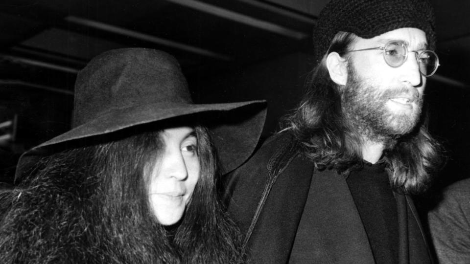 John Lennon, with Yoko Ono. Everett Collection.