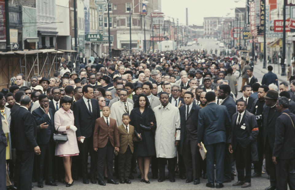 Crowds surrounding Dr. Martin Luther King Jr. (Getty Images)