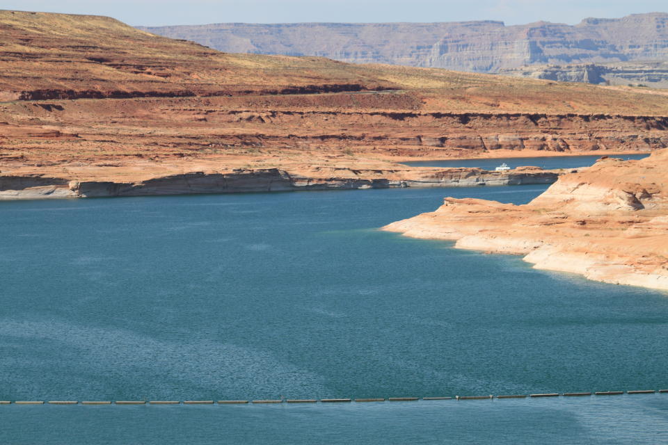 This Aug. 21, 2019 image shows Lake Powell near Page, Arizona. A plan by Utah could open the door to the state pursuing an expensive pipeline that critics say could further deplete the lake, which is a key indicator of the Colorado River's health. (AP Photo/Susan Montoya Bryan)