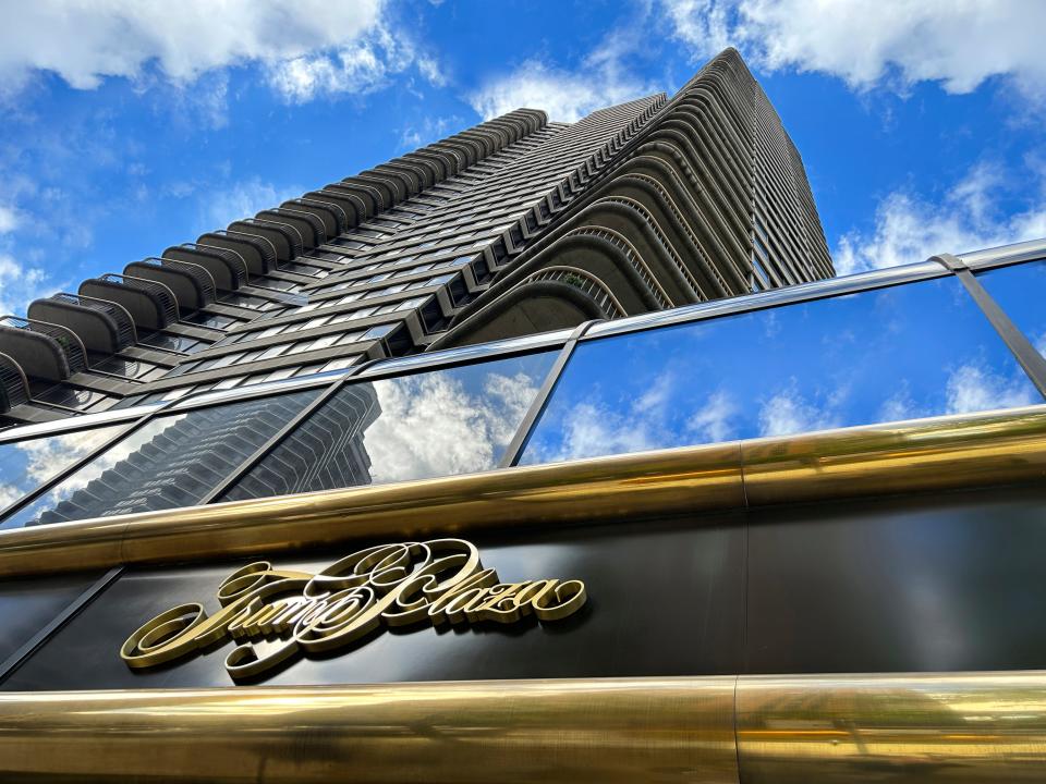 The gold-plated entrance of the Trump Plaza looking upwards to the 36-story skyline