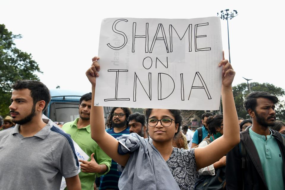 Students and activists hold placards and shout slogans during a protest against the Indian government's Citizenship Amendment Bill (CAB) in in Bangalore on December 16, 2019. - Fresh protests rocked India on December 16 as anger grew over new citizenship legislation slammed as anti-Muslim, after six people died in the northeast and up to 200 were injured in New Delhi. (Photo by Manjunath Kiran / AFP) (Photo by MANJUNATH KIRAN/AFP via Getty Images)