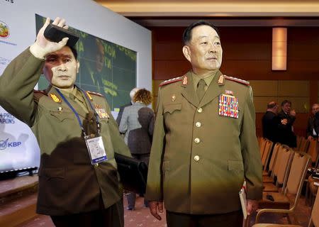 Senior North Korean military officer Hyon Yong Chol (R) attends the 4th Moscow Conference on International Security (MCIS) in Moscow in this April 16, 2015 file photo. REUTERS/Sergei Karpukhin/Files