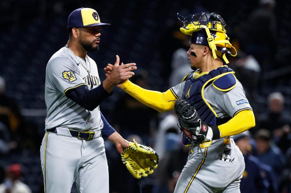 Apr 24, 2024; Pittsburgh, Pennsylvania, USA; Milwaukee Brewers relief pitcher Joel Payamps (31) and catcher William Contreras (24) shake hands after defeating the Pittsburgh Pirates at PNC Park. The Brewers won 3-2. Mandatory Credit: Charles LeClaire-USA TODAY Sports