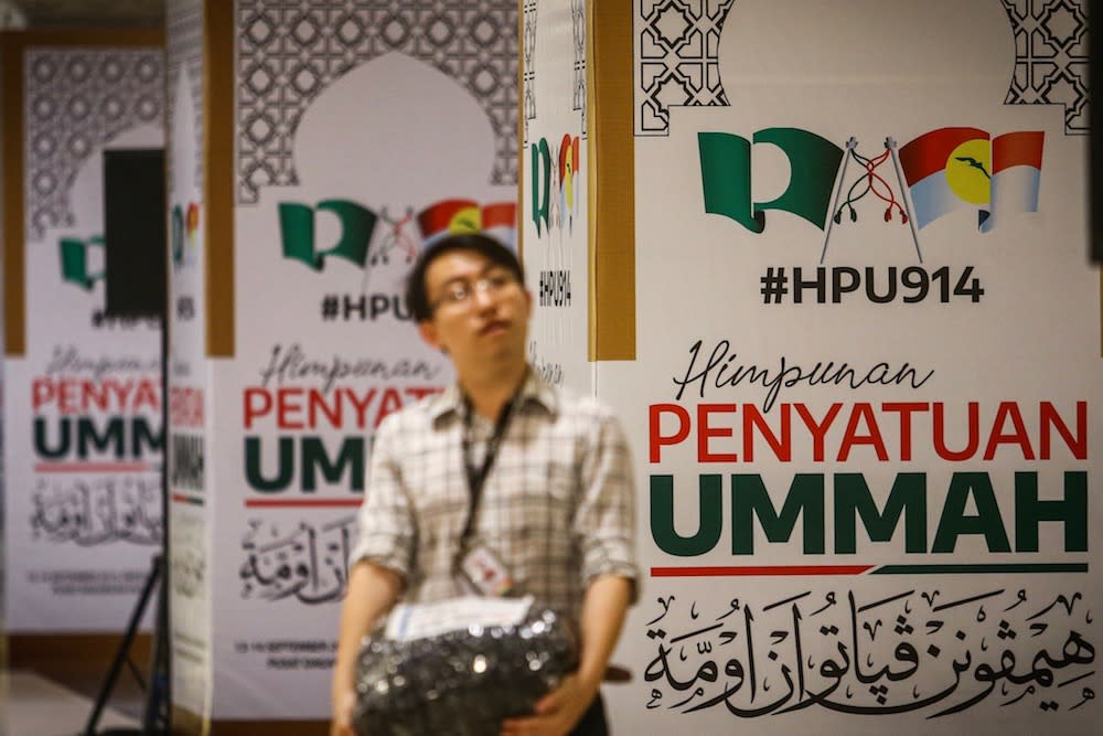 Posters for the Muslim Unity Rally are seen in the lobby of Putra World Trade Centre in Kuala Lumpur September 12, 2019. — Picture by Hari Anggara